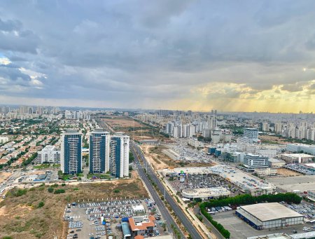 aerial view of Petah Tikva & Kiryat Uno Cityscape in israel with golden sunset and clear sky
