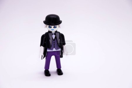 Photo for Playmobil Zombie doll. Children's toy on the theme of Halloween on a white background isolated. Person disguised as the living dead. - Royalty Free Image