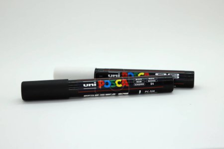 Uni Posca brand fibers. Fibers that write on any type of surface without erasing. School, artistic and office supplies on white isolated background.