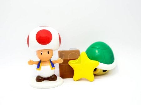 Téléchargez les photos : Super Mario Bros. MacDonald's Happy Meal Toys. Crapaud. Super Mario Bros et ses amis. Super célèbre jeu vidéo. Isolé. Star. Une boîte. Personnages de jeux vidéo. Nintendo. - en image libre de droit
