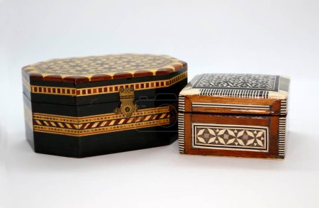 Classic crafts from Granada, Spain. Handmade intarsia wood box. Wooden, mother-of-pearl and bone box. Moroccan crafts.