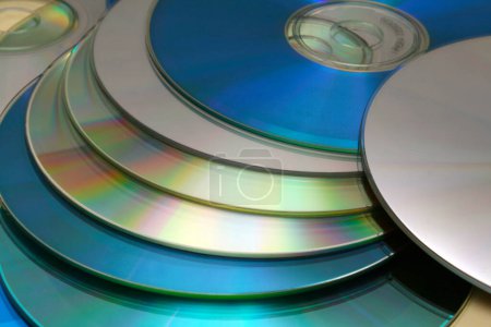 Photo for CD. CDs. Digital file storage system. Writable disk for computers. Digital file reader. Compact disc. Optical disc. Compact Disc Recordable. - Royalty Free Image