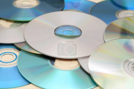 Photo for CD. CDs. Digital file storage system. Writable disk for computers. Digital file reader. Compact disc. Optical disc. Compact Disc Recordable. - Royalty Free Image
