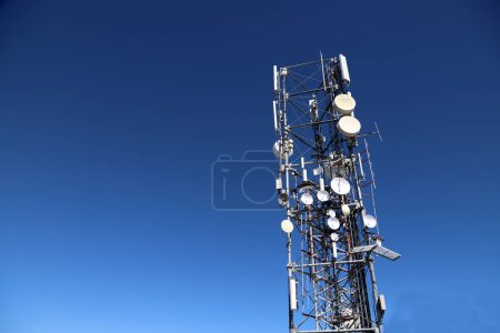 Photo for Telecommunications antennas. satellite antenna. Satellite dish. Telephone and telecommunications antenna. Multi-antenna. Simple dipole, yagi, omnidirectional and parabolic. - Royalty Free Image