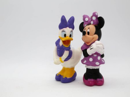 Photo for Minnie Mouse and Daisy Duck. Toys. Cartoons characters from Walt Disney Pictures Studios. Minnie is Mickey Mouse's girlfriend. Daisy is Donald Duck's girlfriend. Isolated white. - Royalty Free Image