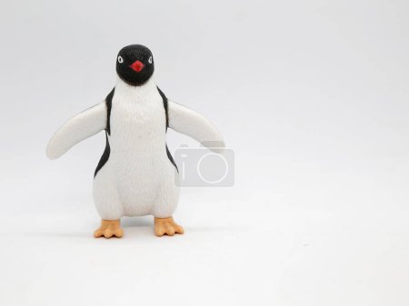 Photo for Happy Feet . Emperor penguin mumble. Movie about a penguin who likes to dance. Animated film. Isolated white copy space. Animal. Toy. - Royalty Free Image