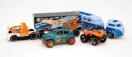 Photo for Hot Wheels cars and trucks. Collectible toys for children. Classic cars. Famous cars. Cargo and transportation truck. Vehicles. Logos. - Royalty Free Image