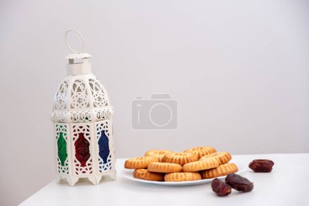 dates kahk eid sweets and fanos on white isolated background