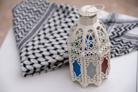 Photo for Palestine keffiyeh with ramadan lantern on isolated background - Royalty Free Image