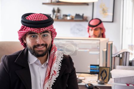 portrait for arabic male during work in office with smile on his face