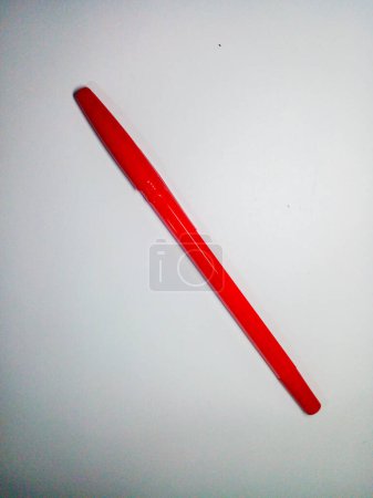 Photo for Red ballpoint pen on white background. One red pen for writing. - Royalty Free Image