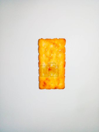 Photo for Square biscuit with liquid sugar on top. Biscuit are yellow. - Royalty Free Image