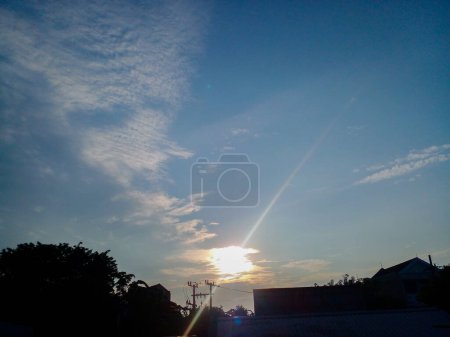 Photo for The sun rises in the morning sky. Portrait of the sky from the roof of the house. - Royalty Free Image