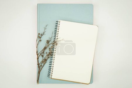 Foto de Minimalistic background with blank notepad, flat lay, copy space. - Imagen libre de derechos