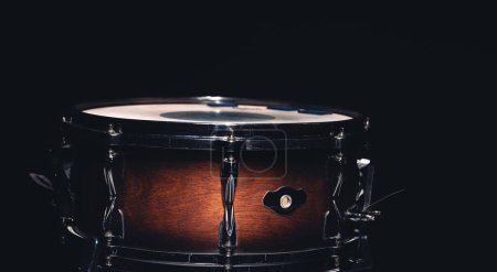 Photo for Close-up of a snare drum, percussion instrument on a dark background. - Royalty Free Image