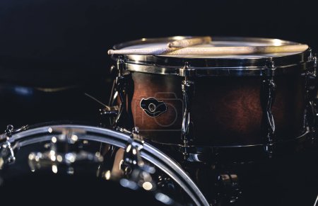 Photo for Snare drum on a blurred dark background, part of a drum kit, music concert cncept. - Royalty Free Image
