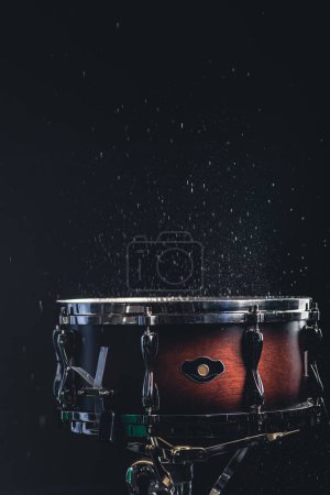 Photo for Beautiful snare drum on a black background with reflection, for advertising and inscription. - Royalty Free Image