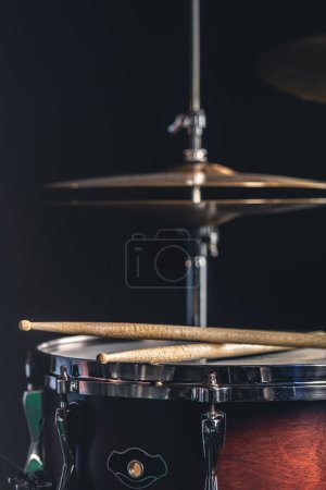 Photo for Snare drum and cymbals on a black background, percussion instrument close-up. - Royalty Free Image