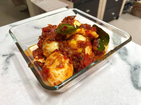 Telur Balado (Eggs in chili sauce). It is a traditional food of Indonesia. Balado is a type of hot and spicy bumbu (spice mixture) found in Minang cuisine of West Sumatra, Indonesia.