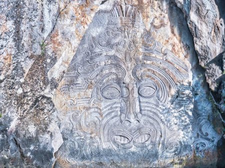 Rock carving of Ngatoroirangi, Mine Bay Taupo, New Zealand