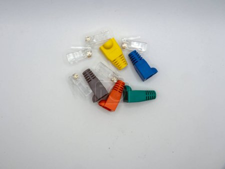 Local area network or LAN cable protector boots , RJ45 connectors on white background