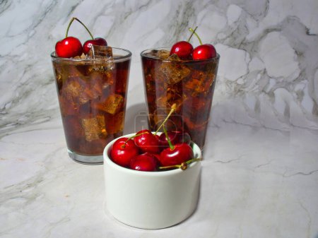 Roy Rogers non-alcoholic cocktail garnished with a maraschino cherry combines cola and grenadine