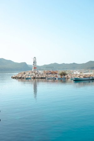 Photo for View of the lighthouse on Kas , Turkiye. Blue sky and sea - Royalty Free Image