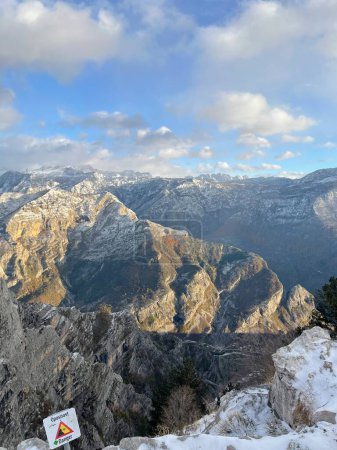 Beautiful huge panorama of landscape with road crossing mountains with ice and snow in Valbona national Park, shkoder, albania. High quality photo