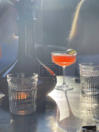 Meeting friends in a cafe with cocktails. High quality photo