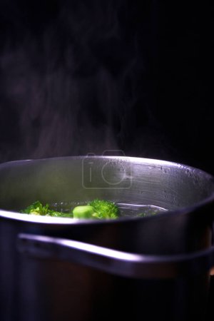 Broccoli in boiling water in a saucepan