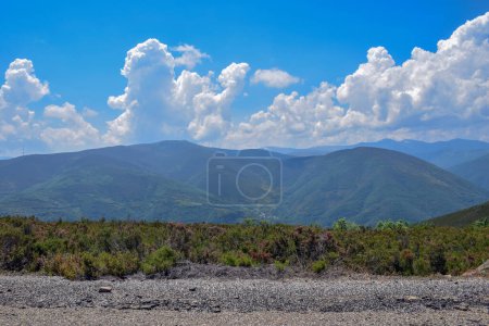 Mountain landscape with blue sky and white clouds