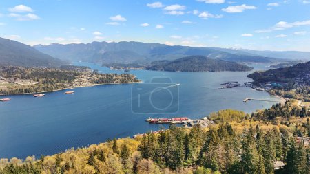 Beautiful aerial view of the Burrard Inlet as seen from North Burnaby during a spring season in British Columbia, Canada.