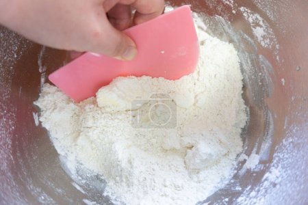 Foto de mezclar harina para productos horneados con tarjeta