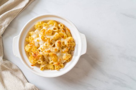 Photo for Mac and cheese, macaroni pasta in cheesy sauce - American style - Royalty Free Image