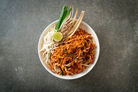 Photo for Stir-fried noodle with tofu and sprouts or Pad Thai - Asian food style - Royalty Free Image