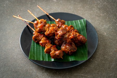 Photo for Grilled chicken gizzard skewer - Asian street food style - Royalty Free Image