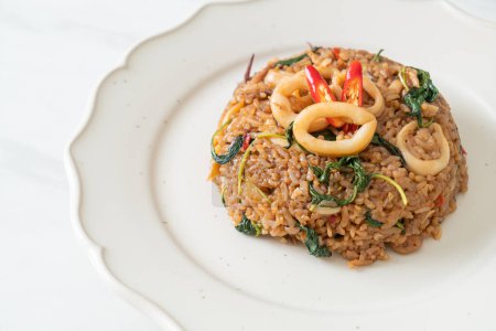 Photo for Fried rice with squid and basil in Thai style - Asian food style - Royalty Free Image