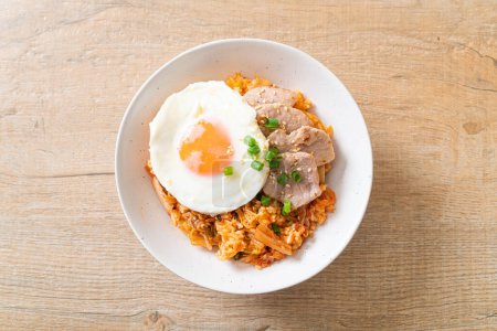 Photo for Kimchi fried rice with fried egg and pork - Korean food style - Royalty Free Image