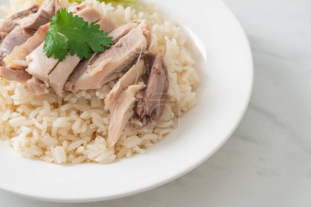 Hainanese Chicken Rice or steamed rice with chicken - Asian food style