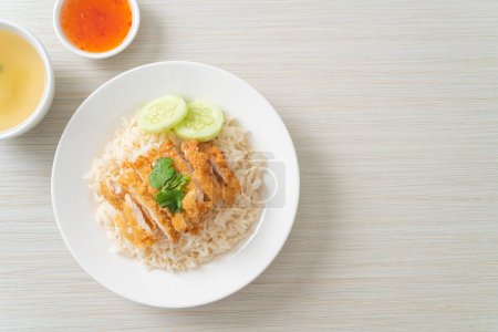 Steamed Rice with Fried Chicken or Hainanese Chicken Rice - Asian food style