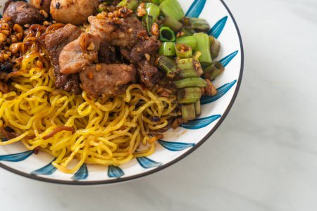 dried egg noodle with pork and meatball - Thai noodles style