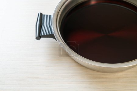 black soup in hot pot for shabu or sukiyaki - Japanese food style