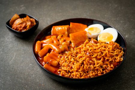Korean instant noodles with Korean rice cake and fish cake and boiled egg - Rabokki - Korean food style