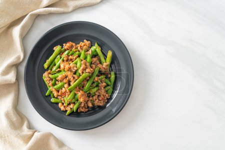Photo for Stir-fried french bean or green bean with minced pork - Asian food style - Royalty Free Image