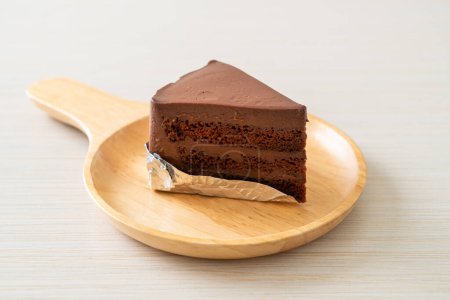 chocolate cake with soft chocolate layer on plate