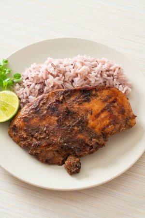 Photo for Spicy grilled Jamaican jerk chicken with rice - Jamaican food style - Royalty Free Image