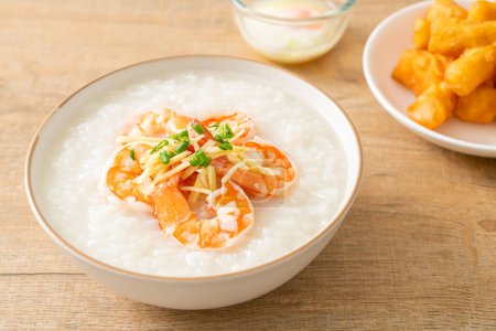 Congee with shrimps and fresh ginger on top