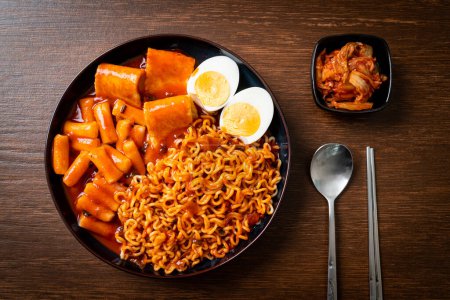 Korean instant noodles with Korean rice cake and fish cake and boiled egg - Rabokki - Korean food style