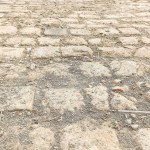 old cobblestone street and soil