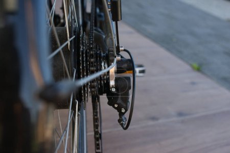 Close-up view of the rear bicycle gear cassette and shifter mechanism.